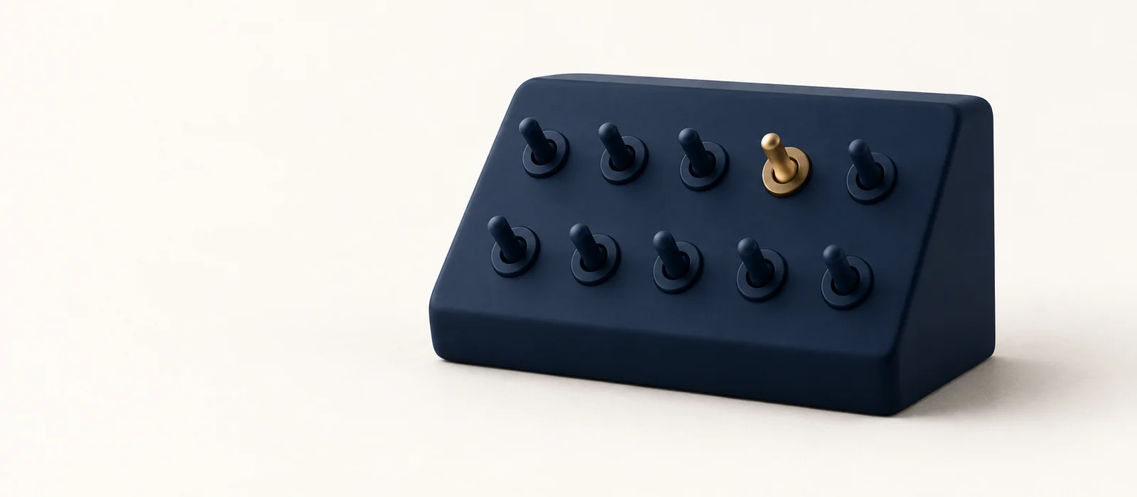 A matte navy panel with rows of toggle switches, one gold, on warm paper.