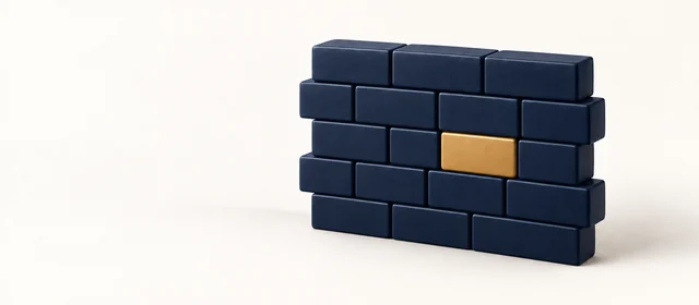 A short segment of matte navy brick wall with one gold brick, on warm paper.